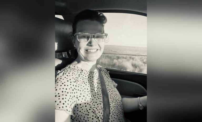 Woman in car, selfie, black-and-white photo