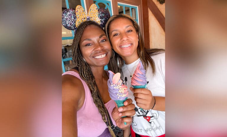Mother and teen daughter with ice cream cones, color photo