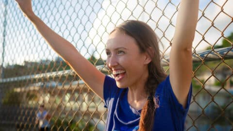 Mom cheering at sports event