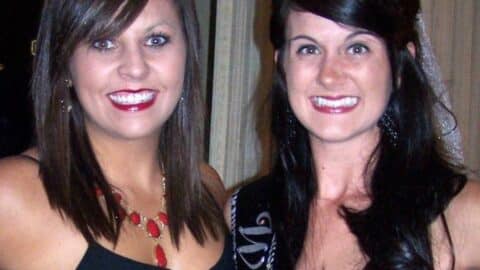 Two women, smiling