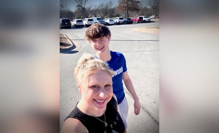 Mother and son smiling in selfie outside