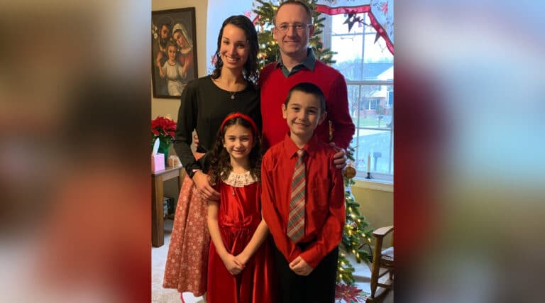 Family posing in Christmas picture