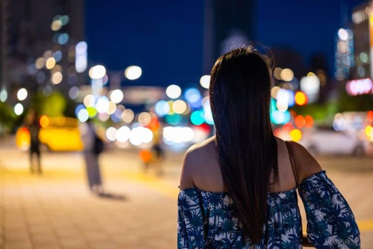 Woman walking in city
