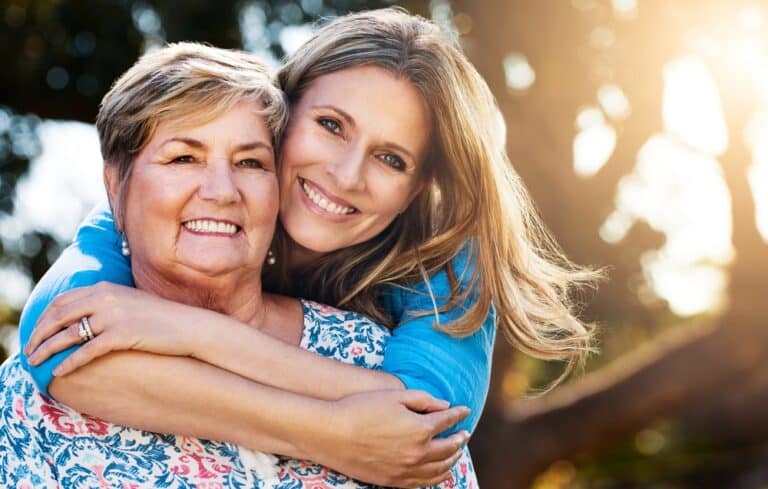 Woman hugging mother
