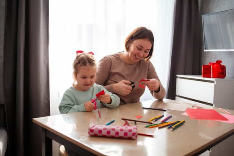 Mother and child make Valentine's Day crafts