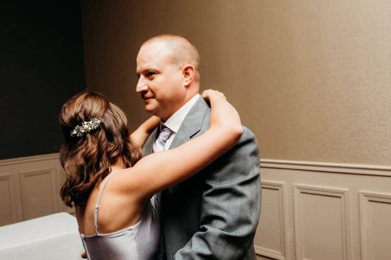 Man and woman dressed up dancing