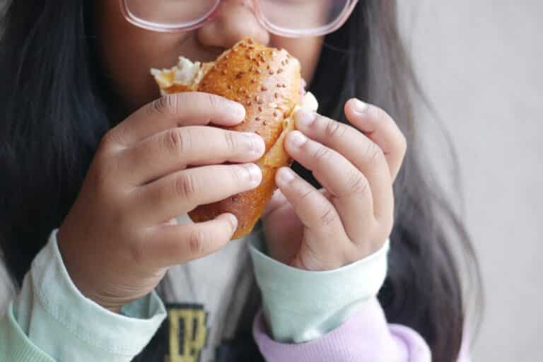 Child eating bagel