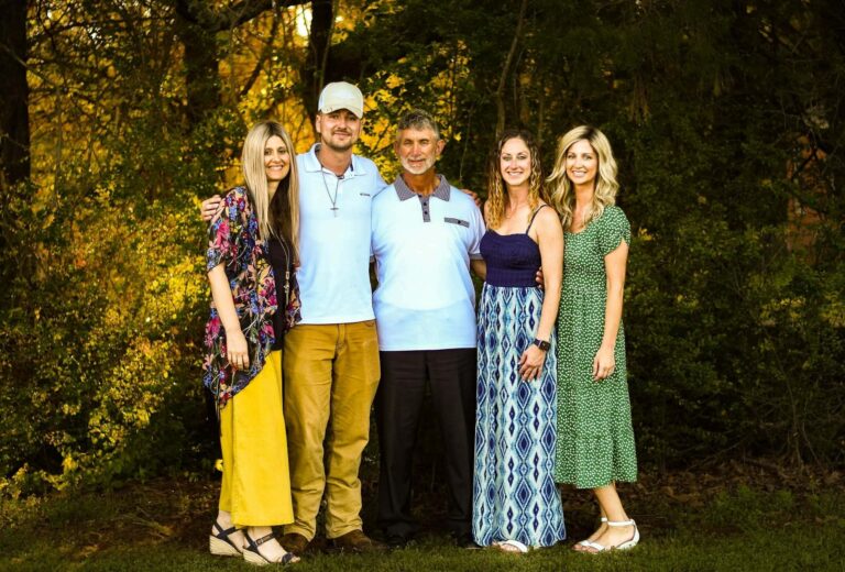 Family smiling in posed photo