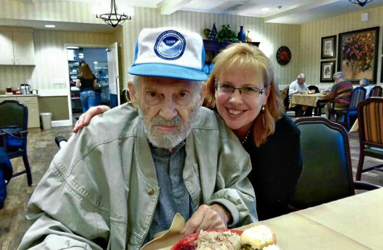 Grown daughter and elderly father