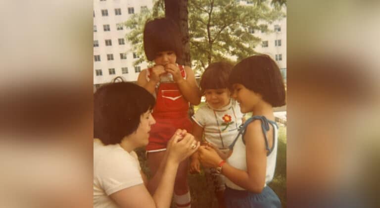 Vintage photo of mother and three young kids