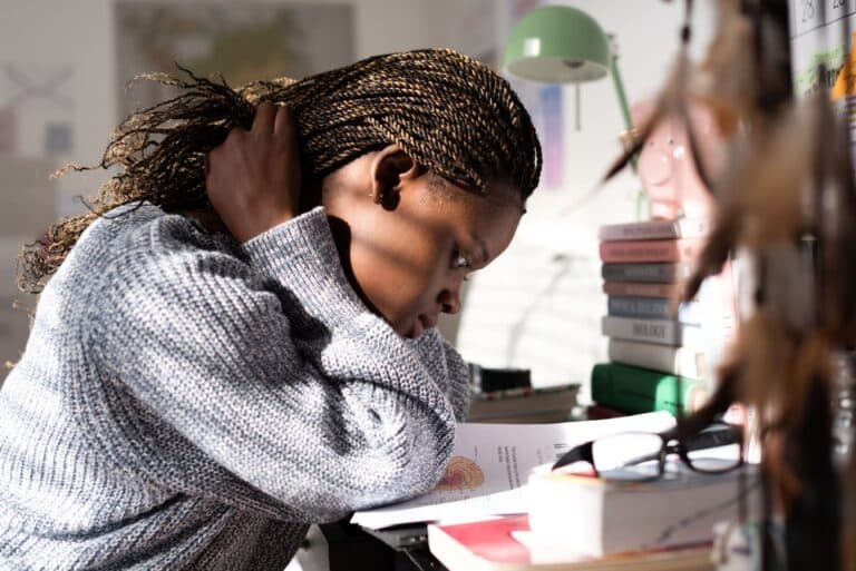 Teen girl studying at desk