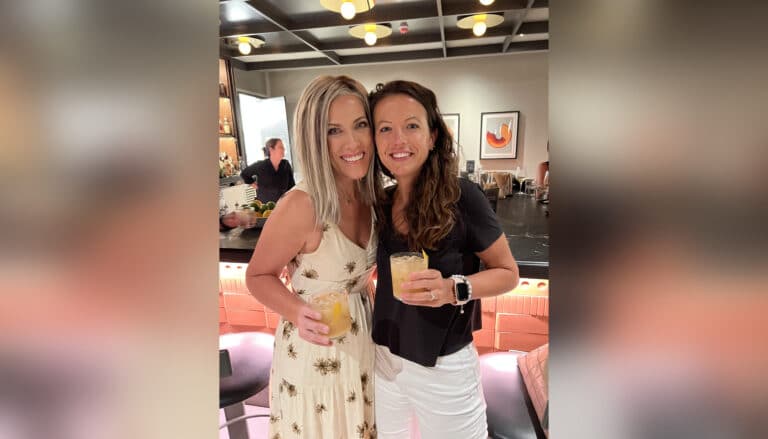 Two women friends smiling