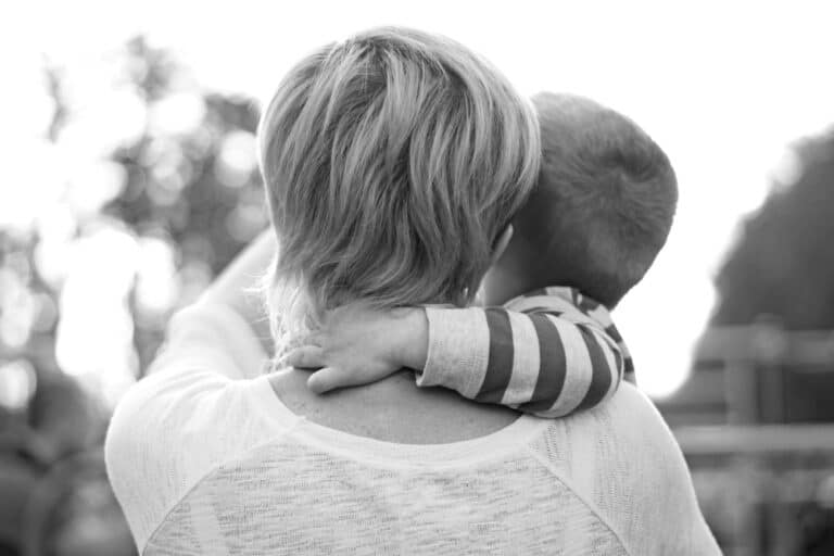 Child hugging mother